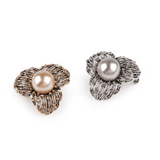   Brooch with rhinestones and pearl  